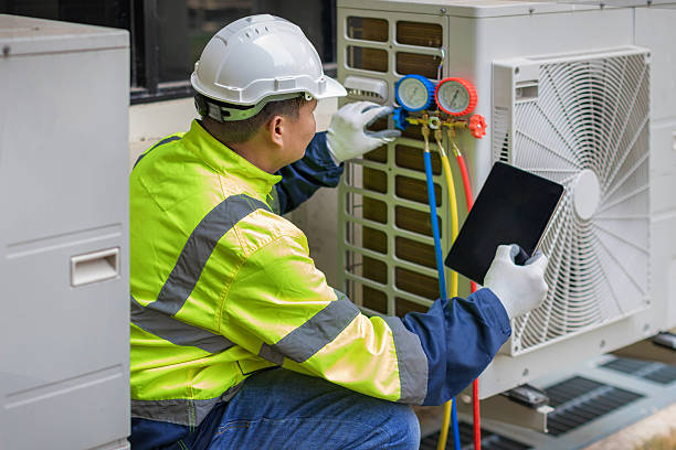Professional Hvac technician working in Fond du Lac, WI